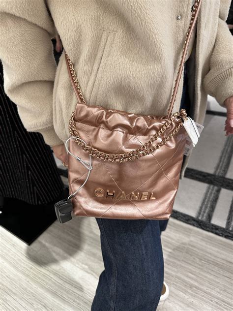 chanel beige bag mini|chanel bag 22 price.